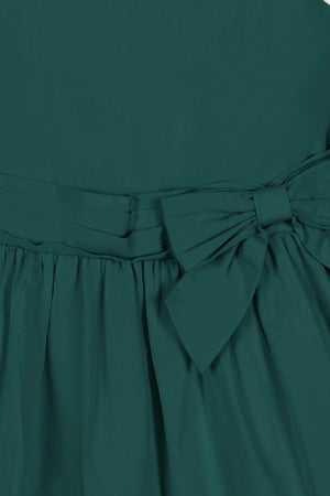 Deep green organic cotton sateen party dress featuring a tiered skirt and a waist sash with a bow. Ideal for toddlers and girls, this dress combines style with sustainability.