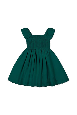 Deep green organic cotton sateen dress featuring a stretchy smocked bodice and gently puffed sleeves, perfect for toddlers and girls. Ideal for special occasions and comfortable wear.