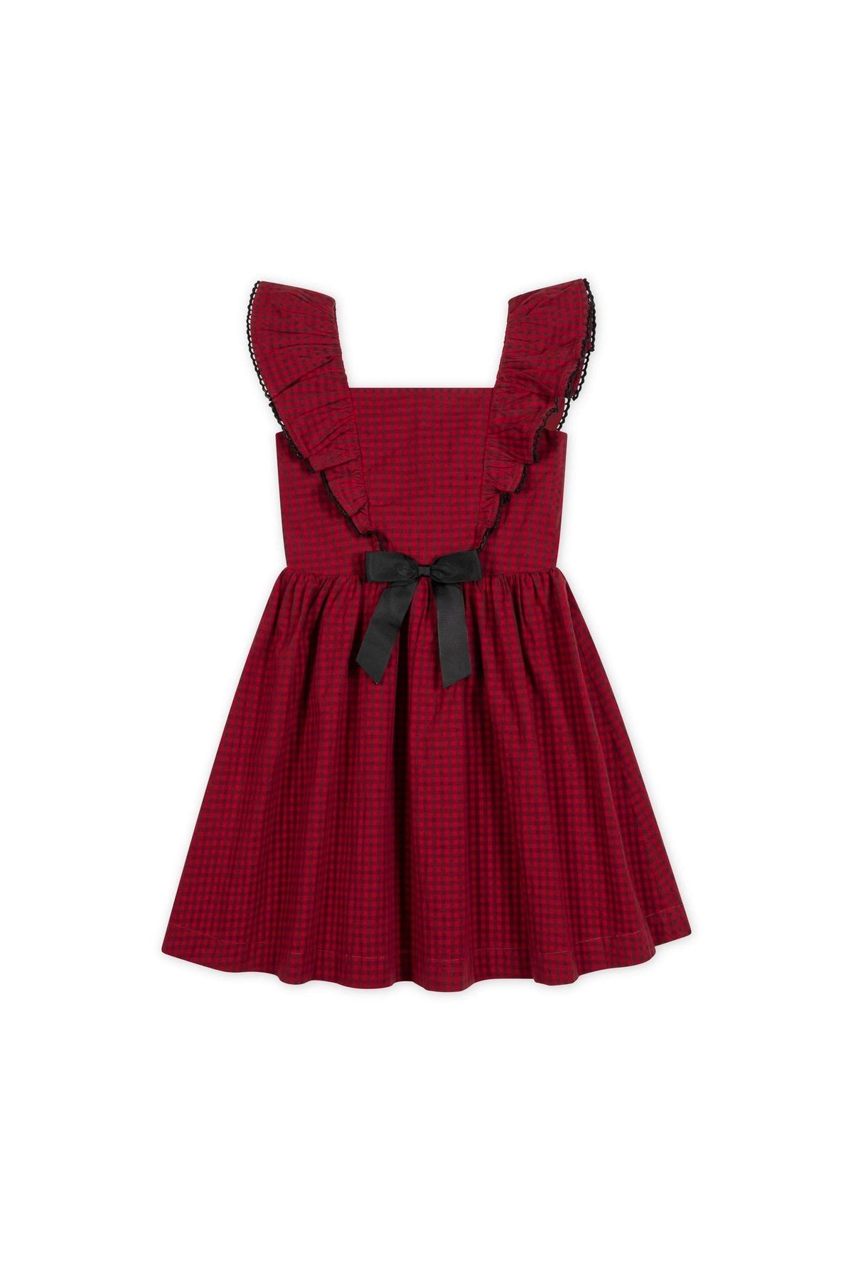 A red gingham jumper dress featuring ruffled sleeves and a black bow detail at the waist. Made from organic cotton, it is perfect for toddlers and young girls.