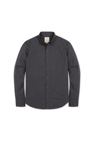 A black gingham long sleeve button-down shirt made from soft stretch organic cotton poplin, featuring a functional chest pocket and a small canvas logo label at the inner placket.
