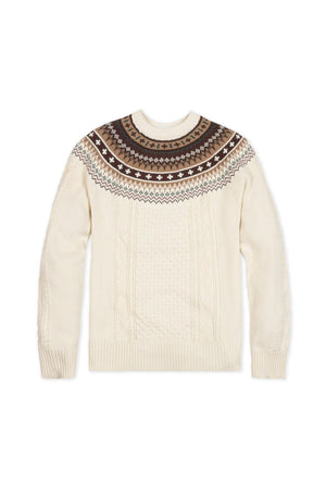 Ivory organic cotton sweater featuring a festive Fair Isle design in brown at the shoulders, transitioning into a textured cable knit on the bodice and sleeves. Ideal for family matching.