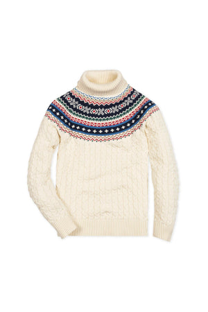 Ivory organic cotton sweater featuring a fair isle pattern in navy, red, and white along the shoulders, with a cozy turtleneck and cable knit texture, ideal for stylish warmth.
