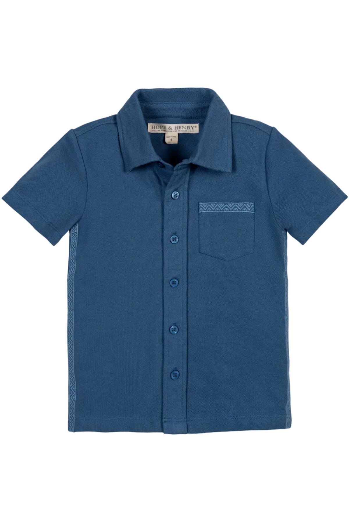 A stone blue short sleeve button-down shirt made from soft organic cotton features a pocket and subtle patterned detailing. Ideal for warm weather, this shirt is perfect for ages 2T-12.