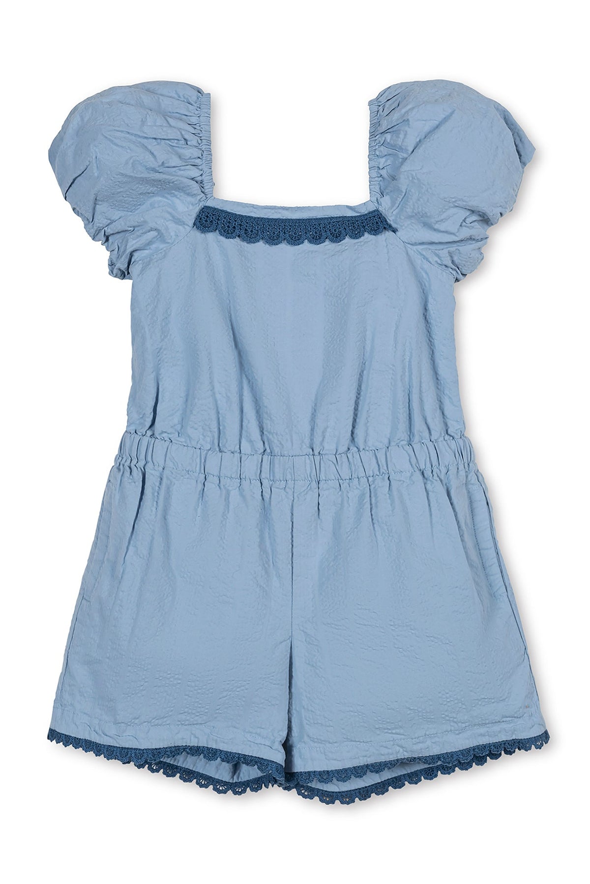 Light blue organic cotton romper featuring puff sleeves and crochet trim. The elastic waistband provides a comfortable fit, making it perfect for toddlers and kids during warm weather.