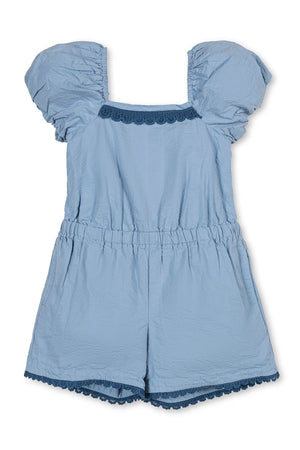 Light blue organic cotton romper featuring puff sleeves and crochet trim. The elastic waistband provides a comfortable fit, making it perfect for toddlers and kids during warm weather.