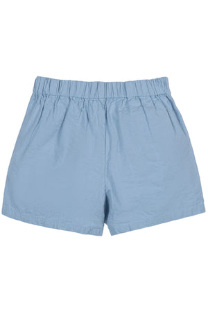 Light blue organic cotton seersucker pull-on shorts feature a comfortable elastic waistband. Ideal for warm weather play, these shorts are designed for children aged 2T to 12 years.