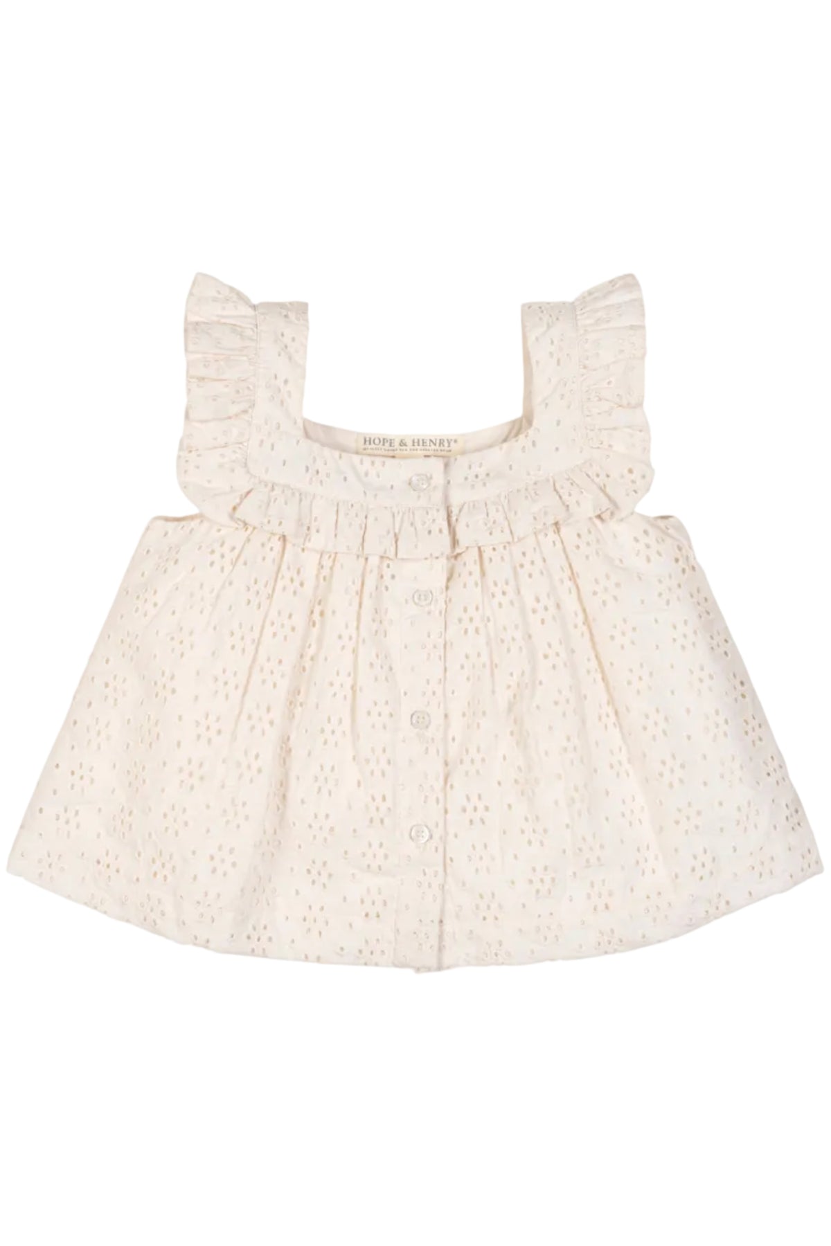 A soft, natural eyelet tank top featuring ruffled edges and a button-down front, made from organic cotton. Ideal for toddlers, this lightweight top is perfect for warm weather outings.