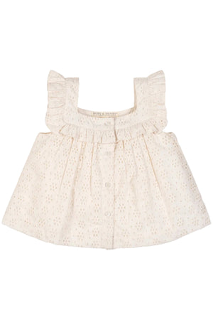 A soft, natural eyelet tank top featuring ruffled edges and a button-down front, made from organic cotton. Ideal for toddlers, this lightweight top is perfect for warm weather outings.