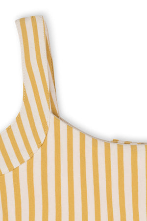 Close-up of a sleeveless, organic cotton tank dress featuring sunny yellow and white stripes. The soft fabric and simple design cater to children aged 2T-12, perfect for warm days.