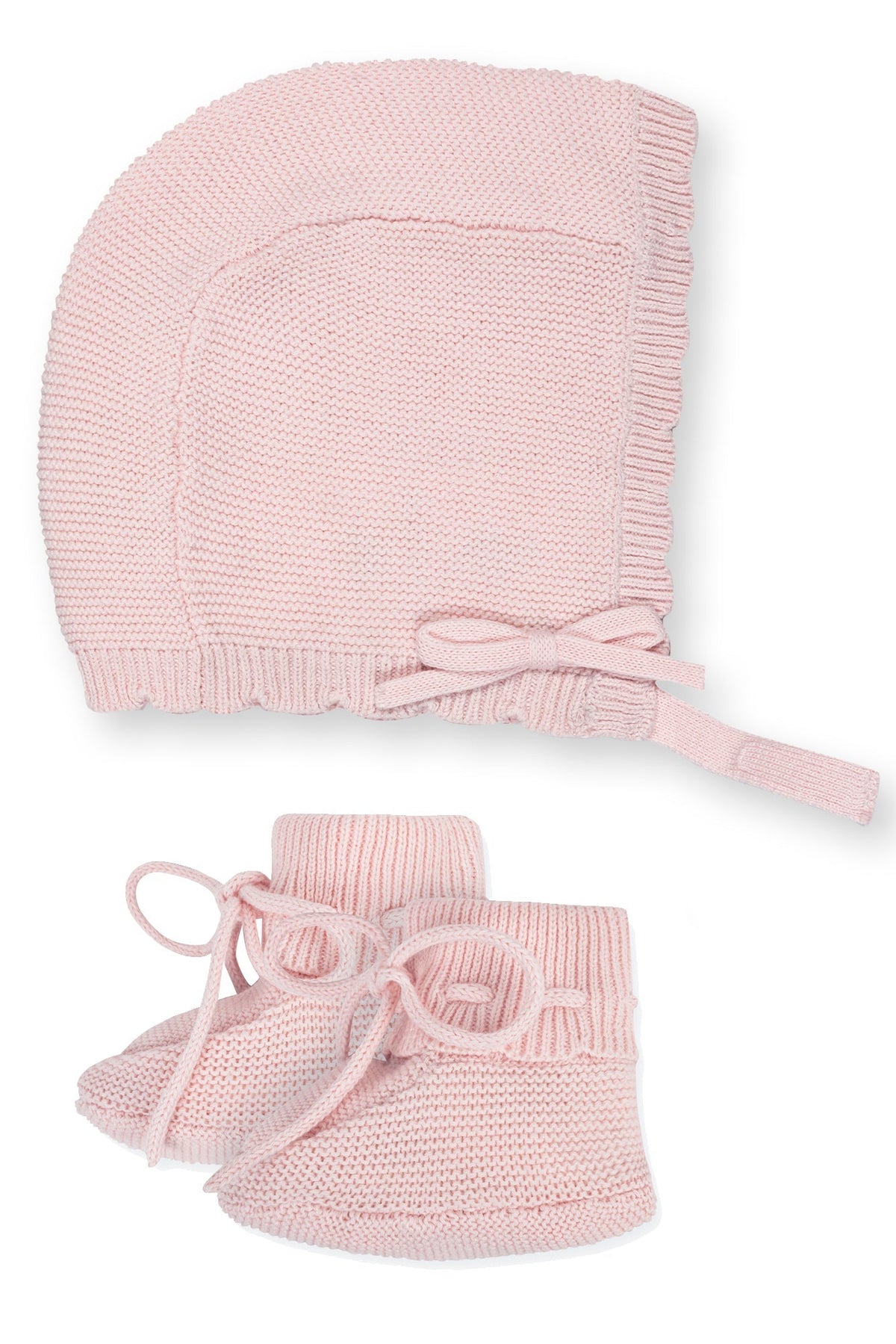 Pale pink organic cotton baby bonnet with rib trim and matching booties, crafted from soft sweater knit, ideal for keeping little ones cozy. Perfect for gifts or heirloom collections.