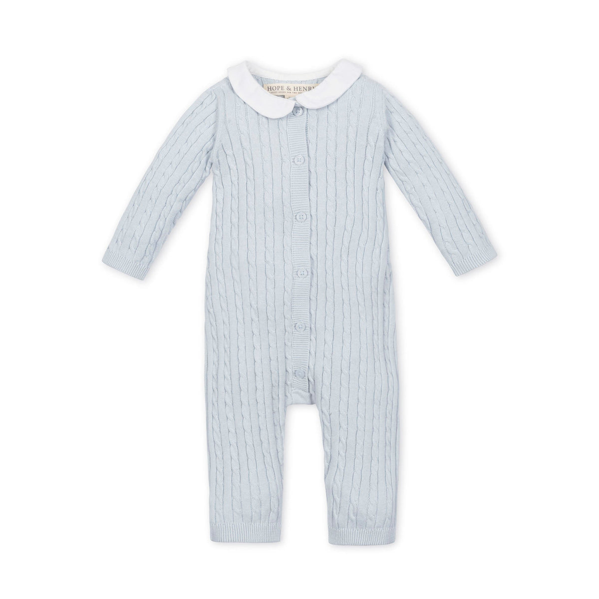 A pale blue, organic cotton romper featuring a classic Peter Pan collar and a textured ribbed design.