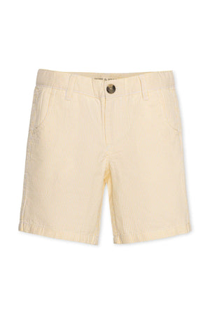 Yellow organic cotton seersucker shorts for boys, featuring a classic striped pattern and a comfortable fit. Ideal for warm weather playdates and everyday adventures, promoting sustainable fashion for kids.