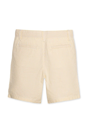 Back view of yellow organic cotton seersucker shorts for boys, featuring a classic striped pattern and two back pockets. Ideal for warm weather play and everyday adventures.