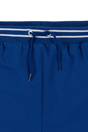Close-up of a blue organic cotton French terry pull-on short featuring a striped elastic waistband and an adjustable drawstring, perfect for active kids aged 4T-14.