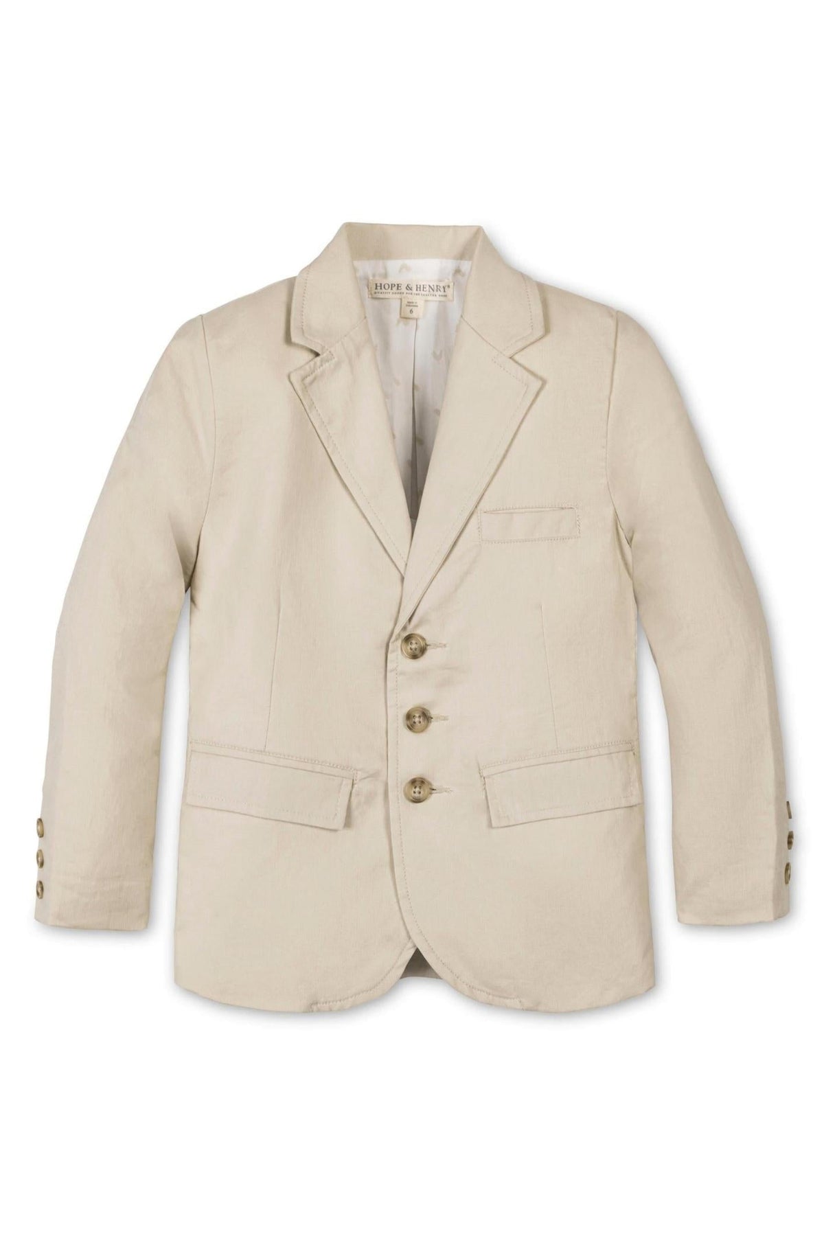 A beige linen suit jacket by Hope & Henry features a button front with faux tortoiseshell buttons, notch collar, and a welt chest pocket, designed for boys aged 2T-12.