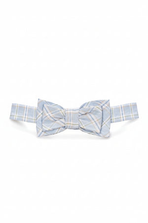 A classic pre-tied bow tie in a chateau blue check pattern, made from organic cotton, suitable for young children.