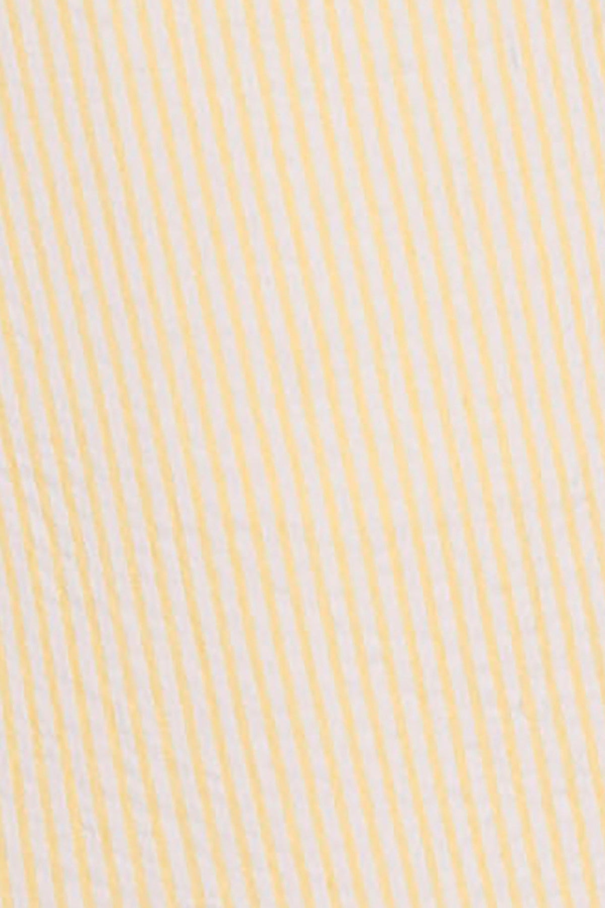 Close-up of a yellow seersucker fabric, featuring alternating thin white and yellow stripes, showcasing a textured finish.