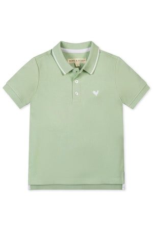 Light green short sleeve polo shirt made from 100% organic cotton, featuring a flat-knit collar and embroidered logo. Ideal for boys aged 2T-18, combining comfort and sustainability.