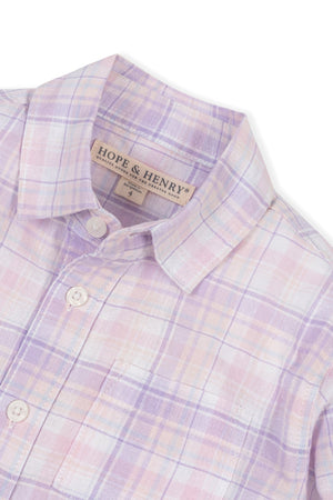 Close-up of a Hope & Henry plaid button-down shirt in lavender tones, featuring a collar, buttons, and a chest pocket.