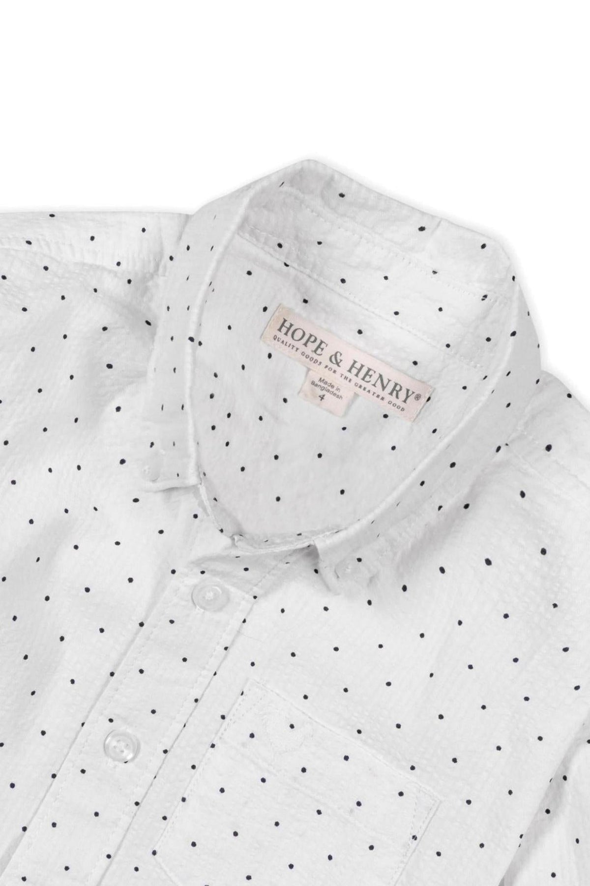 White seersucker shirt with black polka dots, featuring a button-down collar and a chest pocket, by Hope & Henry.