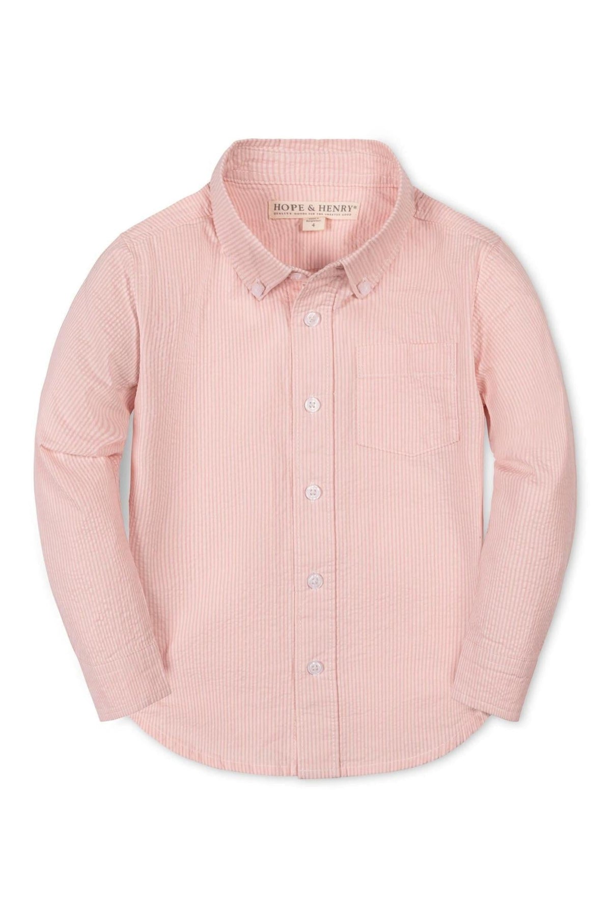 A light pink long-sleeve button-down shirt features a seersucker texture and a chest pocket, ideal for boys ages 2T-18.