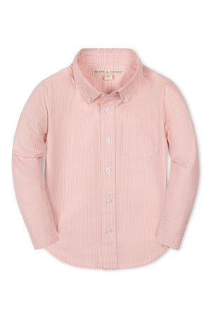 A light pink long-sleeve button-down shirt features a seersucker texture and a chest pocket, ideal for boys ages 2T-18.