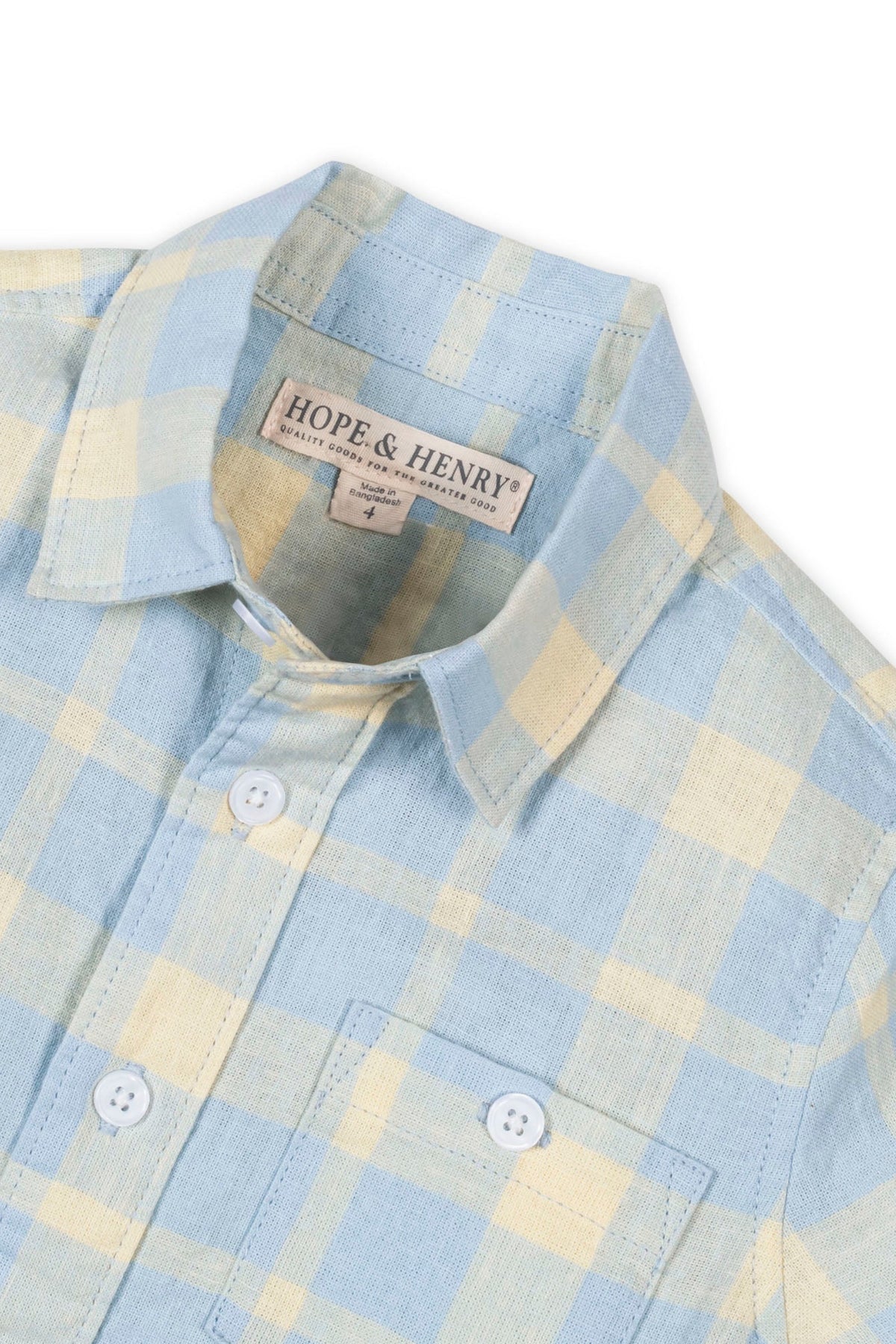 Light blue and yellow plaid short sleeve shirt by Hope & Henry with buttons and chest pocket.