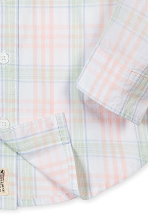 Close-up of a Hope & Henry organic cotton shirt featuring a soft plaid pattern in pastel colors, with a button-down.