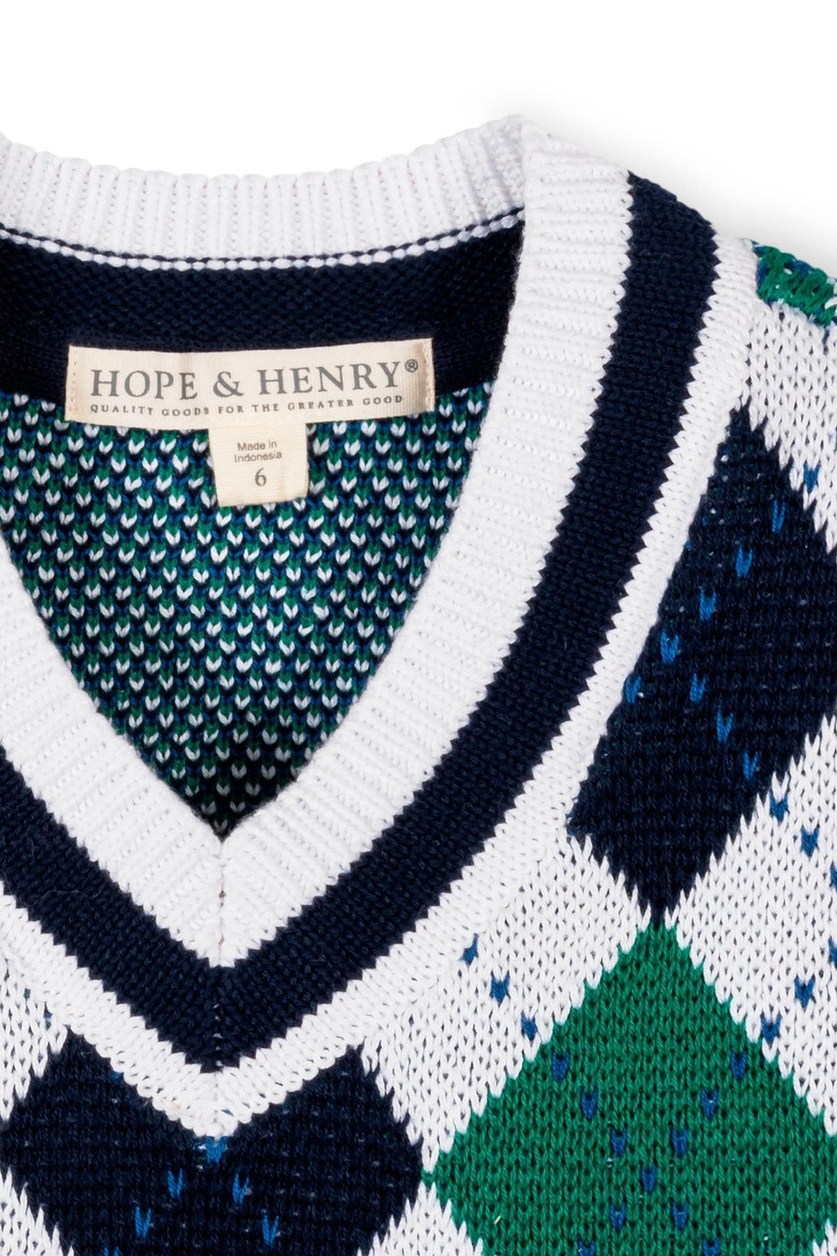 Close-up of a Hope & Henry organic cotton argyle sweater vest featuring a v-neckline, with a diamond pattern in white, green, and navy. Ideal for boys aged 2T-18.