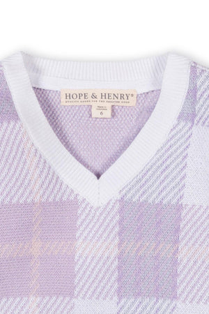 Close-up of a Hope & Henry organic cotton v-neck sweater featuring a lavender plaid pattern and white ribbed neckline.