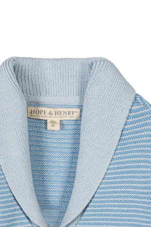 Close-up of a light blue shawl collar cardigan by Hope & Henry, showcasing a textured stitch and brand label.