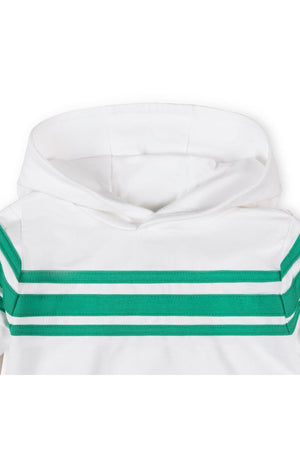 Close-up of a white hoodie featuring green athletic stripes across the chest and sleeves, made from soft organic cotton.