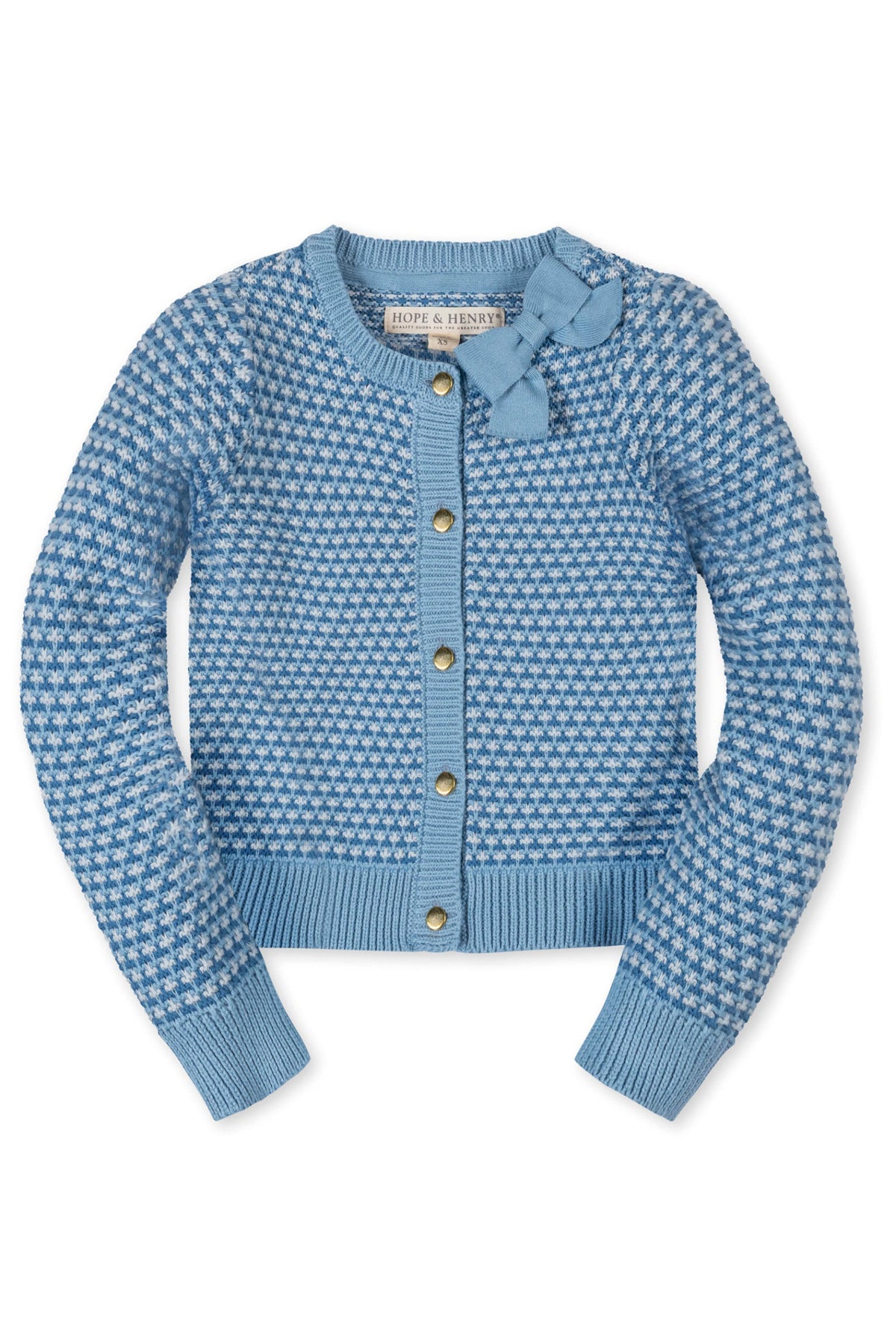 A light blue cardigan by Hope & Henry features a textured tweed stitch and a charming bow detail at the collar. Made from 100% organic cotton, its perfect for toddlers.