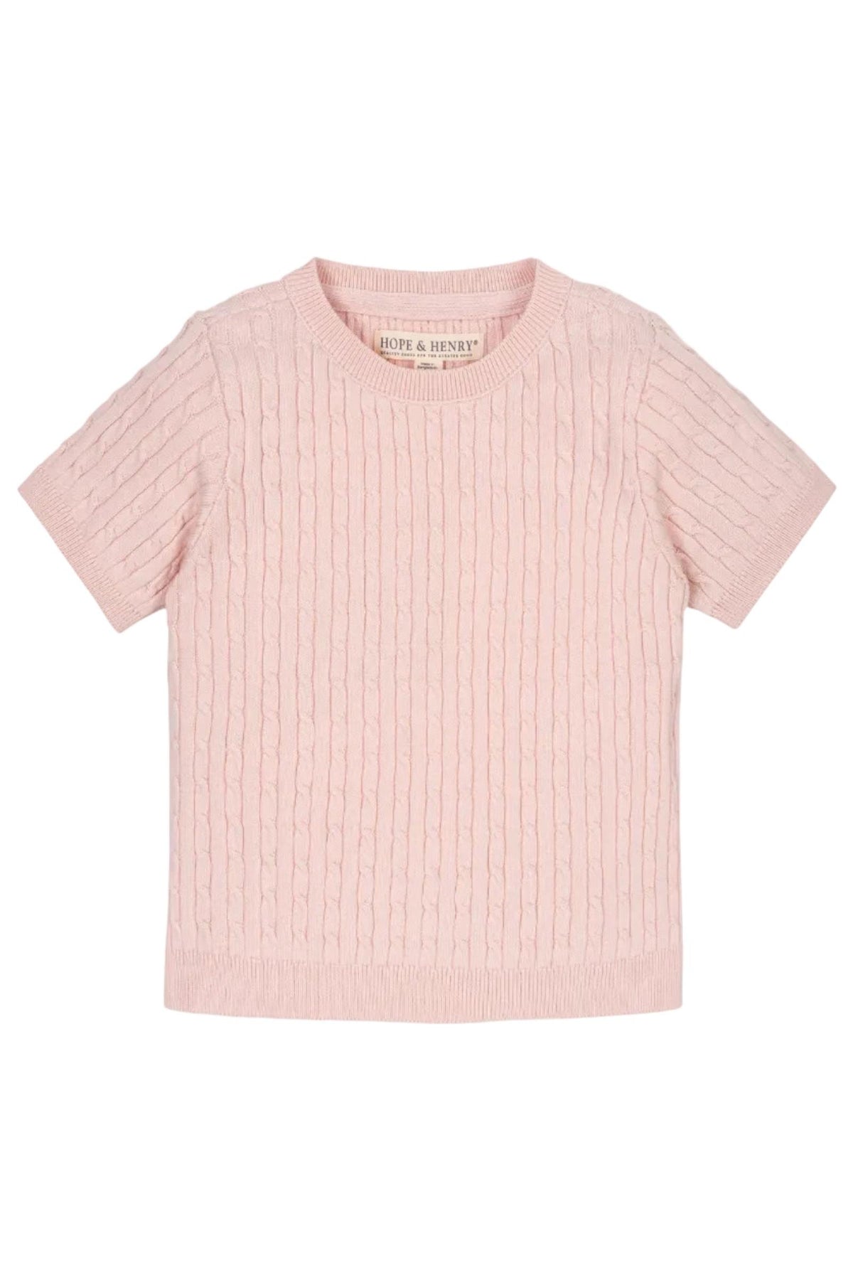 A soft pink short sleeve cable sweater from Hope & Henry, made from 100% organic cotton. It features an allover cable knit design, perfect for girls aged 2T-12.
