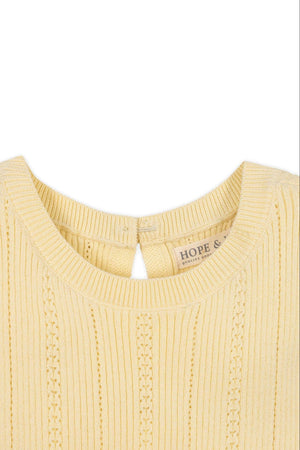 Yellow sweater dress top with ribbed texture and keyhole closure. Made from organic cotton by Hope & Henry.