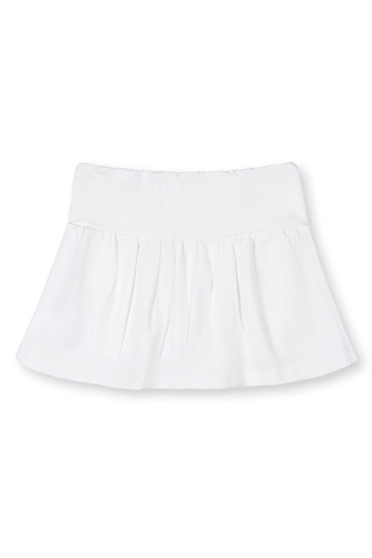 White organic cotton skort featuring a flouncy skirt and elastic back waist. Ideal for children, this soft French terry skort combines comfort and style for active play.