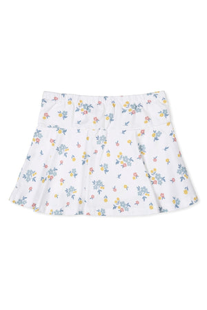 A flouncy skort in soft organic cotton features a white background adorned with colorful floral patterns. It has an elastic back waist, perfect for comfortable play in sizes 2T-12.