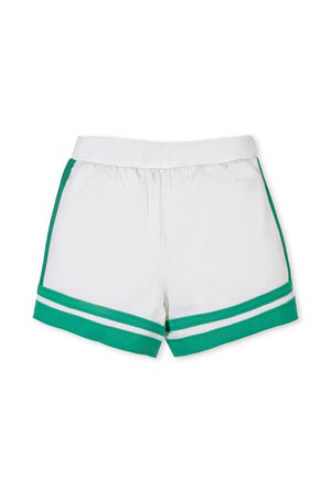 White organic cotton French terry shorts featuring green athletic stripes and an elastic waistband. Designed for toddlers and kids, these shorts offer comfort and a sporty look.
