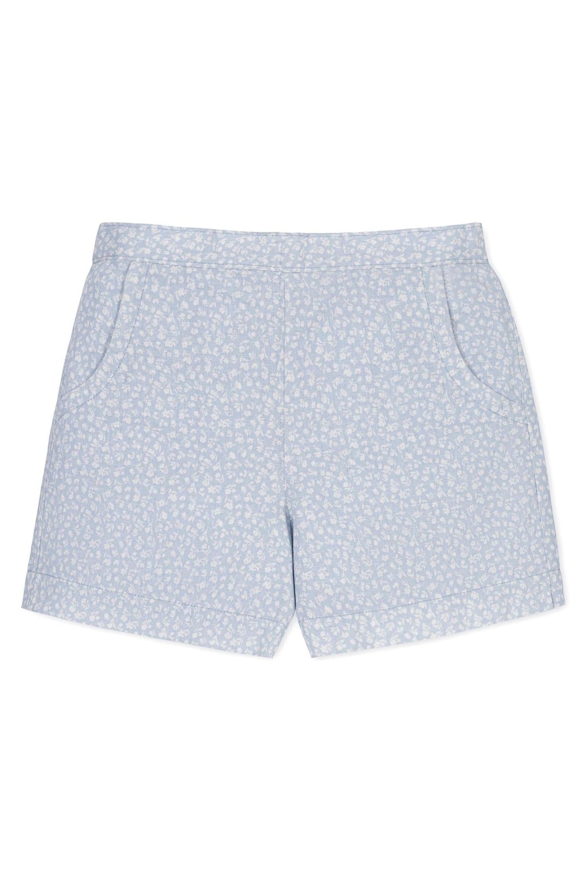 Light blue linen pull-on shorts featuring a delicate white floral pattern, designed for toddlers and kids, with side pockets.