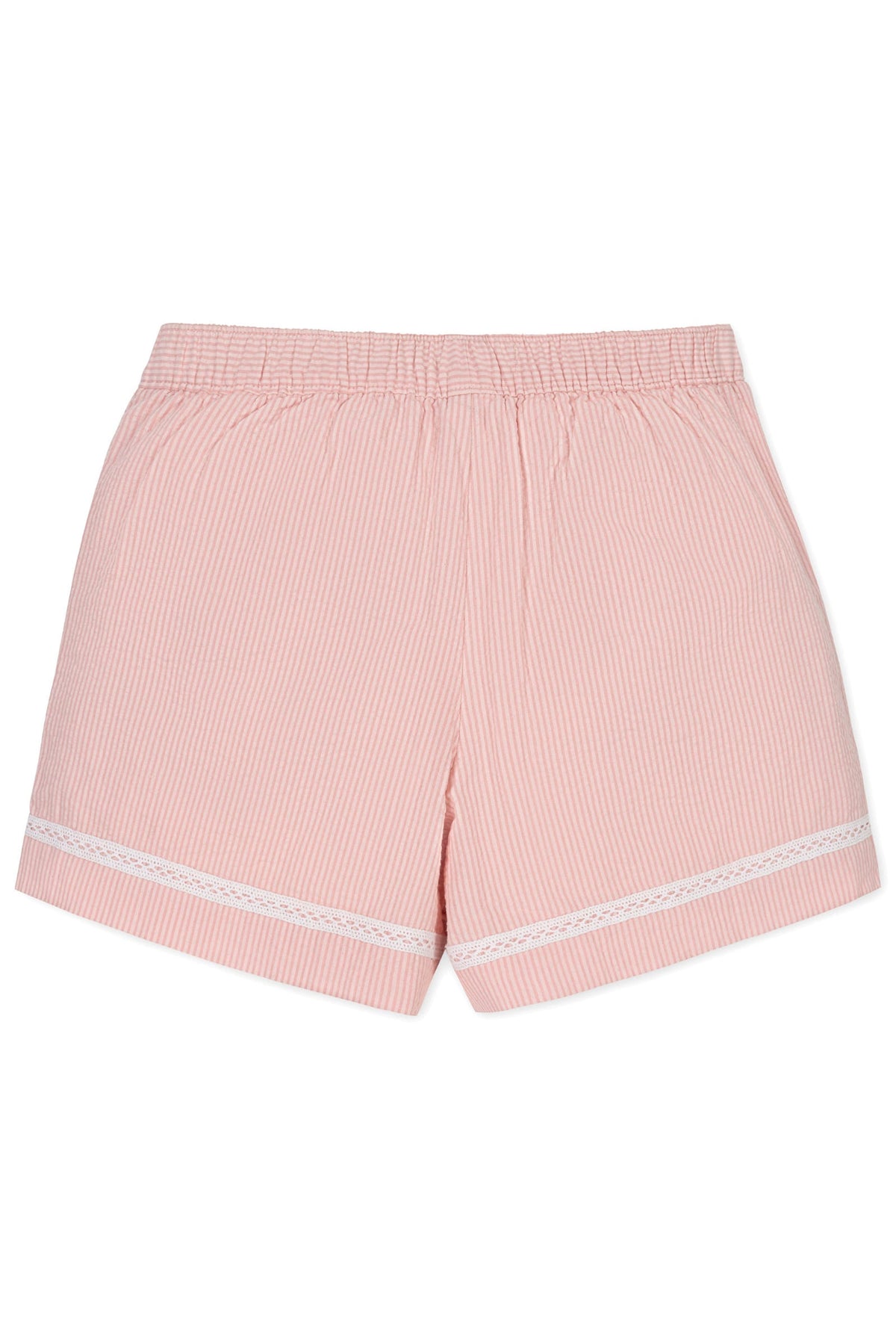 Pink seersucker pull-on shorts feature an elastic waistband, delicate ladder trim at the hem, and are made from organic cotton.