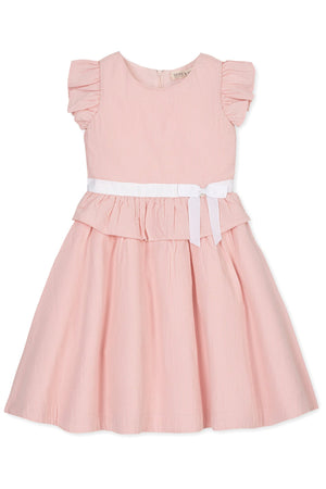 A pink seersucker dress with ruffle sleeves, a peplum waist, and a white sash, designed for girls in sizes 2T-12.