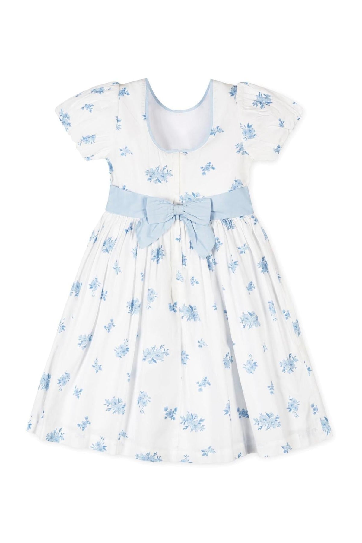 White organic cotton dress featuring delicate blue floral patterns, puff sleeves, and a matching bow at the waist.