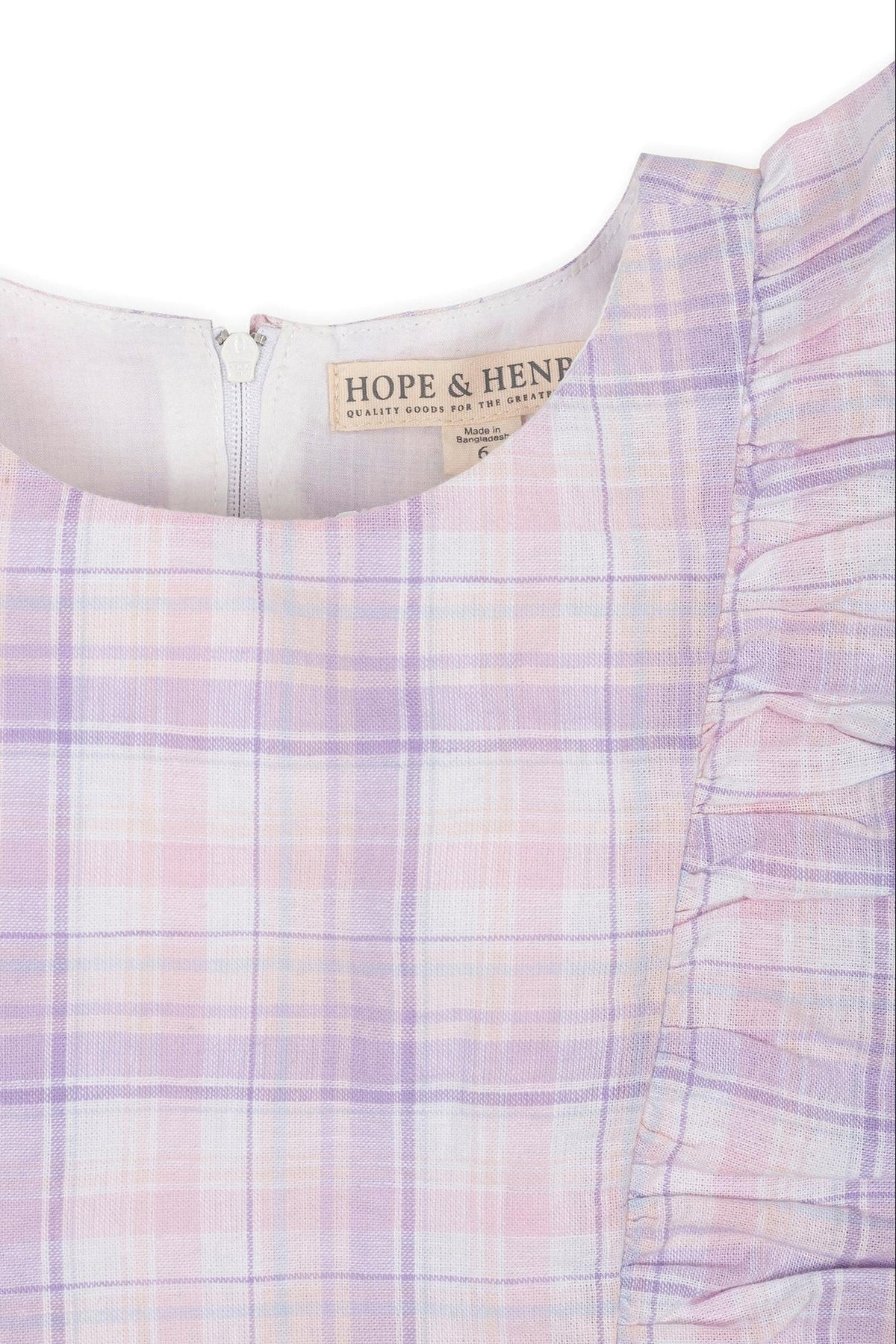 Close-up of a lilac and pink plaid dress featuring flutter sleeves and a zipper closure, labeled Hope & Henry.