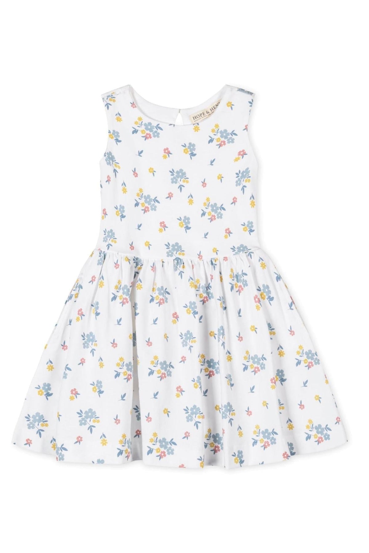 White tank dress featuring a floral pattern in soft blue, pink, and yellow hues, made from organic cotton.