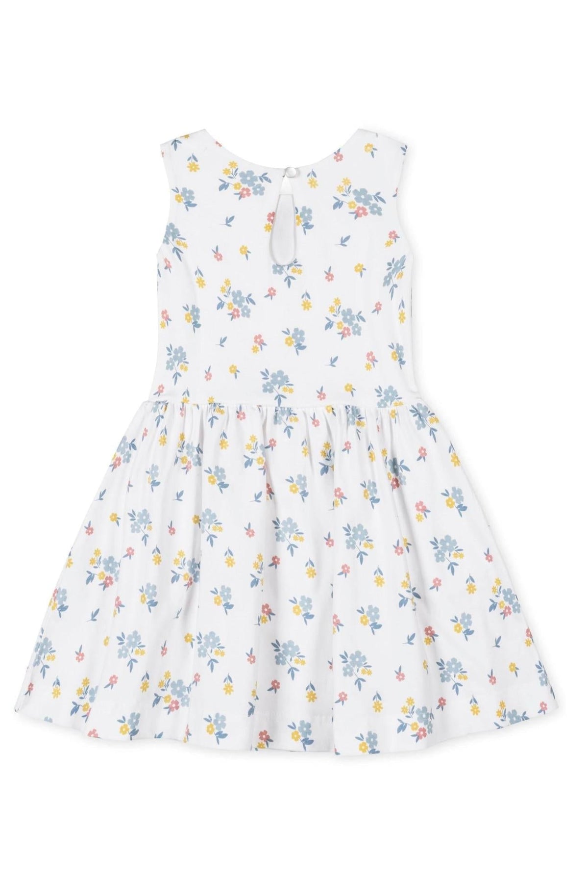 White tank dress featuring a floral pattern in pastel colors, made from soft organic cotton with a twirly skirt.