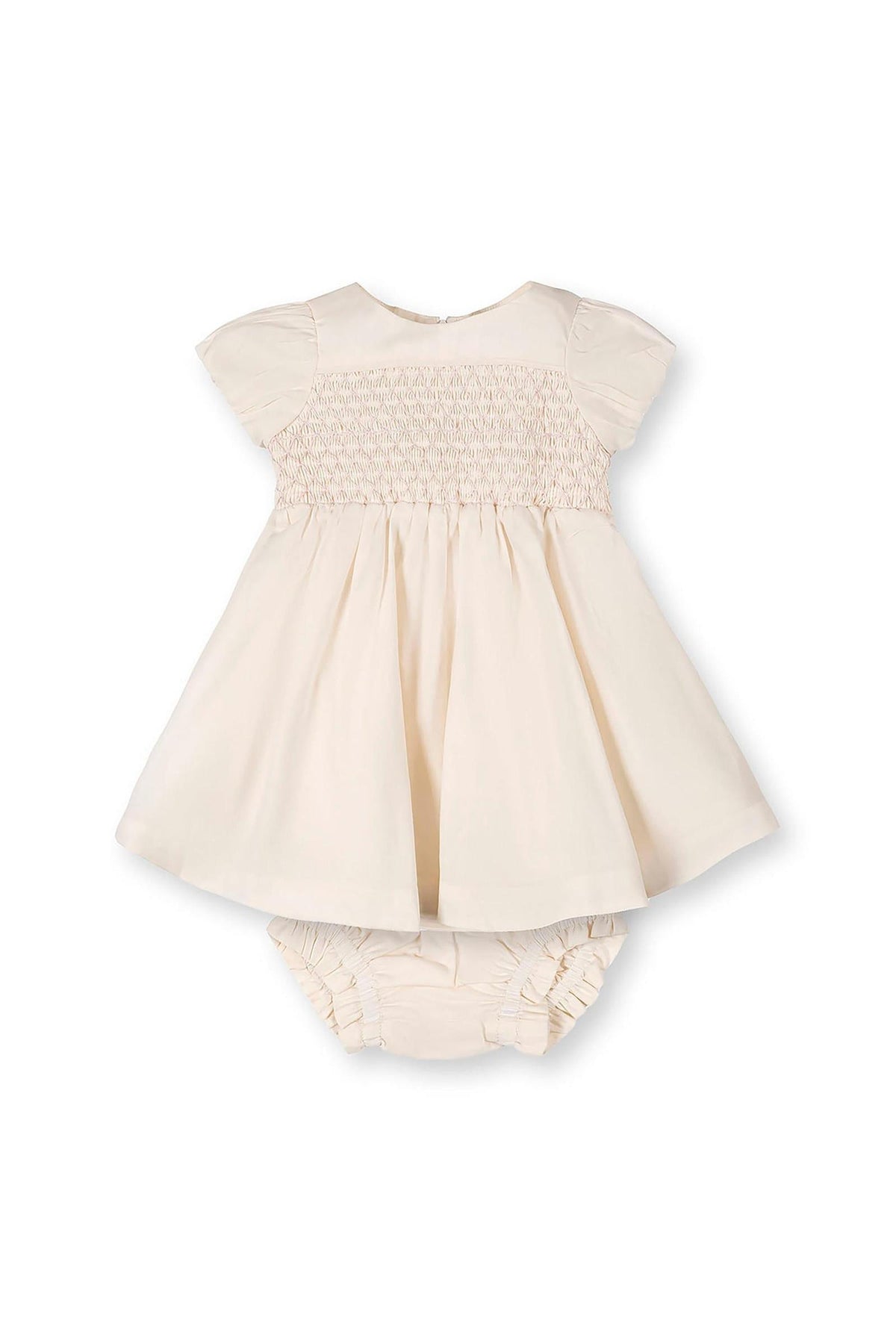 Beige organic cotton baby dress with smocked bodice and puff sleeves, accompanied by a matching diaper cover.
