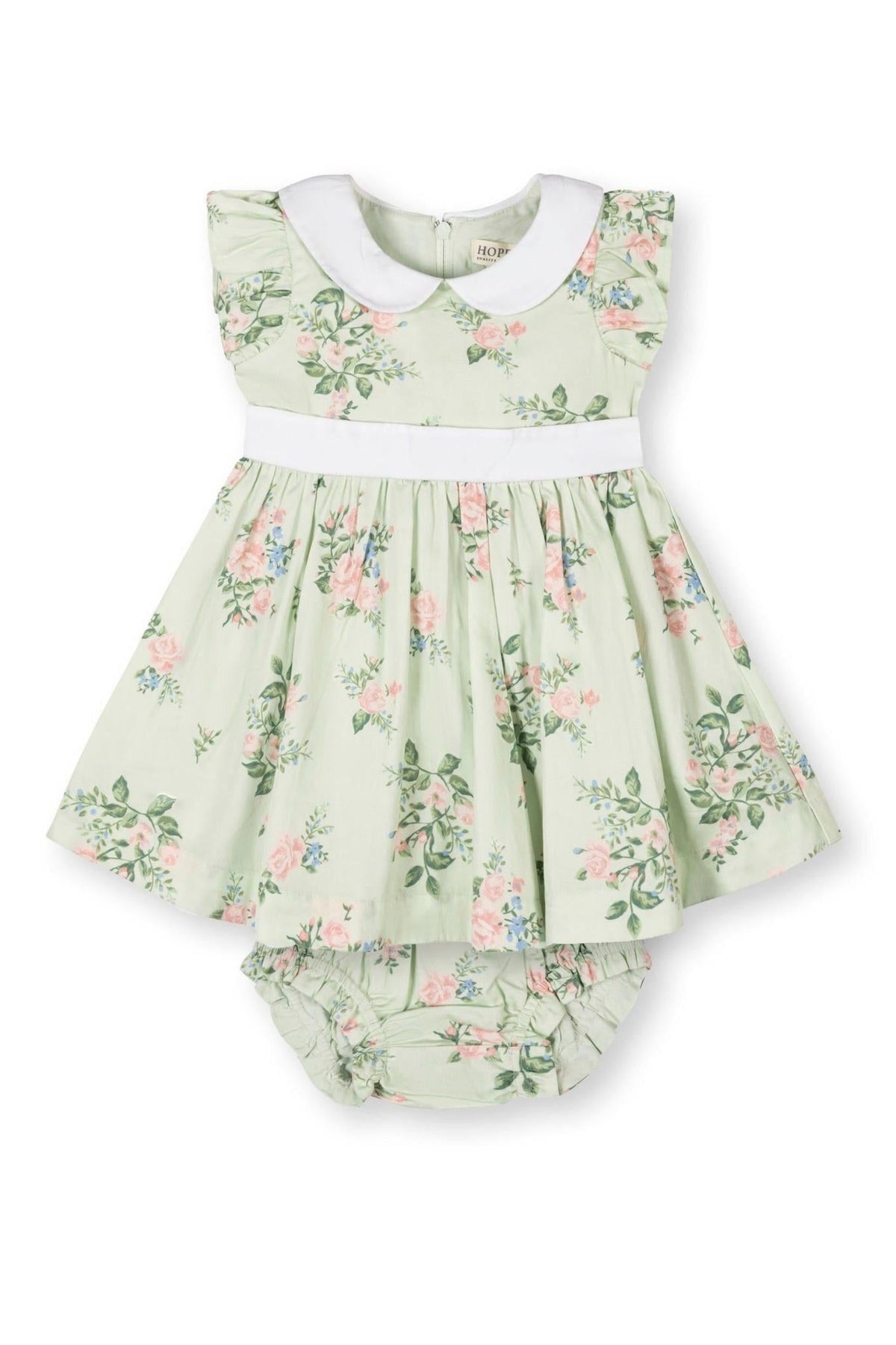 Light green floral dress with a white Peter Pan collar, flutter sleeves, and matching diaper cover, made from organic cotton.