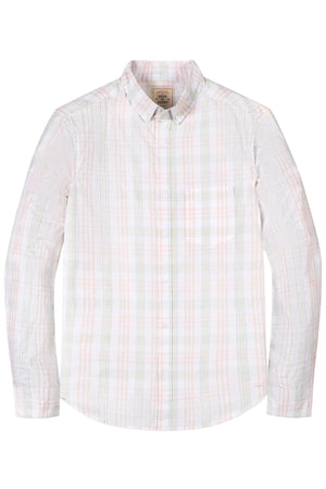 A light-colored, long-sleeve button-down shirt featuring a soft organic cotton poplin fabric with a chateau plaid pattern. It includes a functional chest pocket and a small logo label.