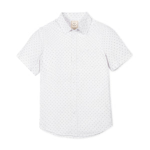 Short sleeve white shirt featuring a subtle black polka dot pattern. Made from organic cotton, this comfortable shirt is perfect for warm weather and casual outings.