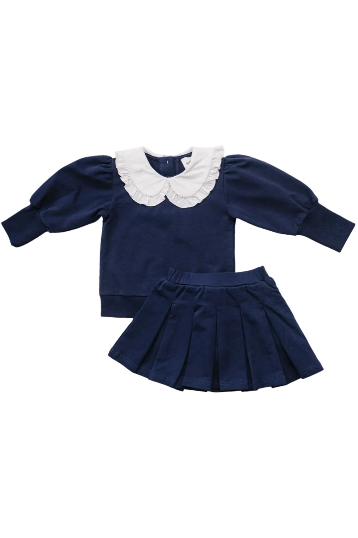 A navy blue top with a white Peter Pan collar is paired with a matching pleated skirt. The set is made from soft cotton, perfect for children’s comfort and style.